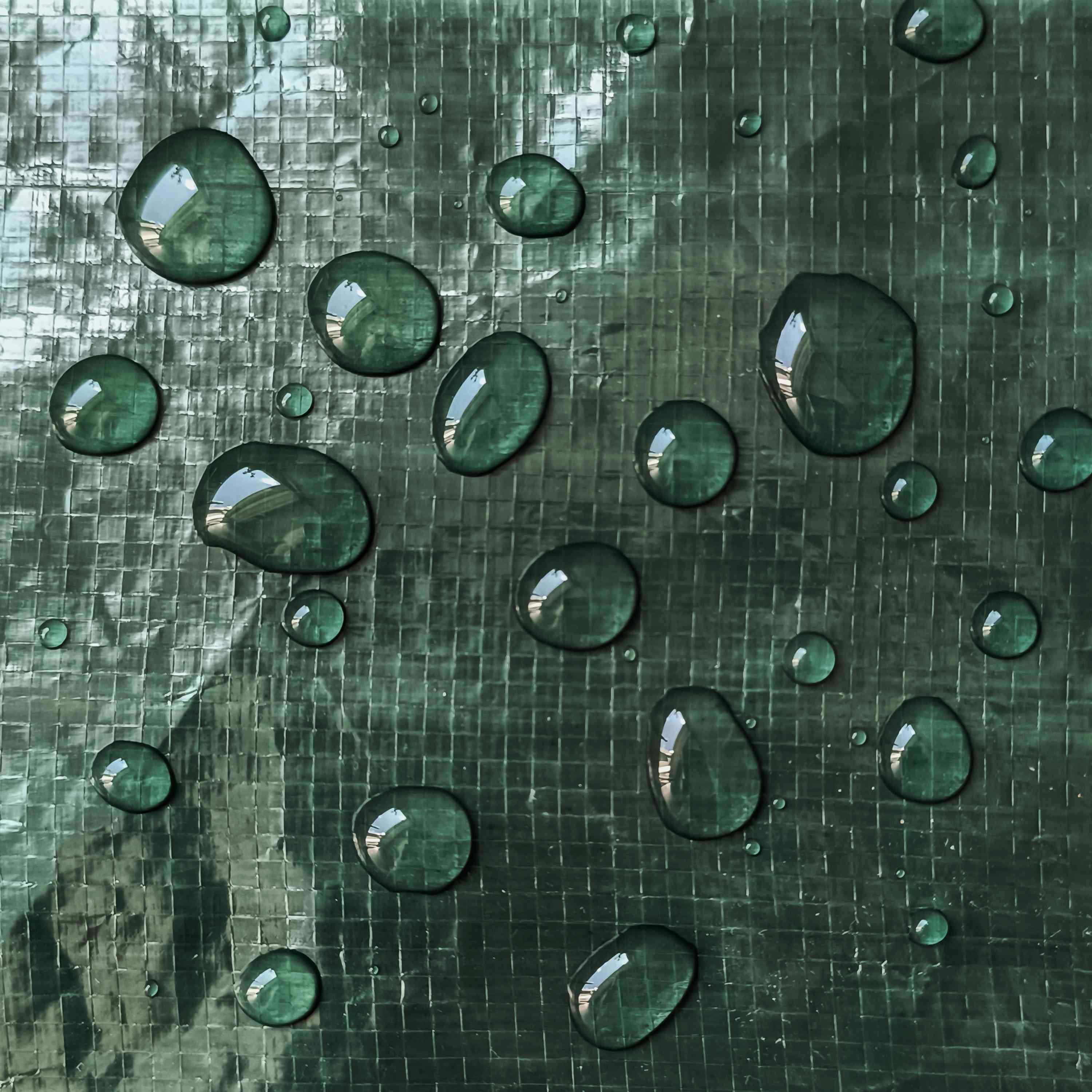 Beschermhoes Domarex KOKON TRIGO detail waterdicht materiaal, waterdruppels